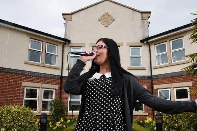 Lucy sings the classics for residents at Longridge Hall