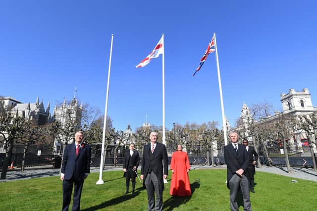 Sir Lindsay Hoyle (front centre) and Nigel Evans MP (front right) at a ceremony to raise the Cross of St. George outside Parliament (image: ©UK Parliament/Jessica Taylor)