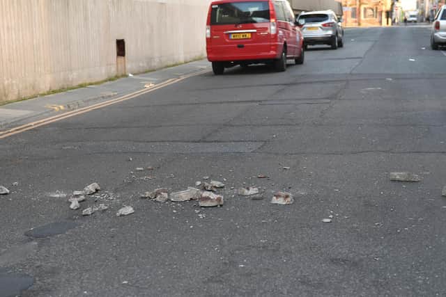 Images appeared to show concrete that had fallen from the above bridge