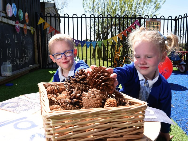 Logan and Lilly practice their counting in the outdoor area, photo: Neil Cross