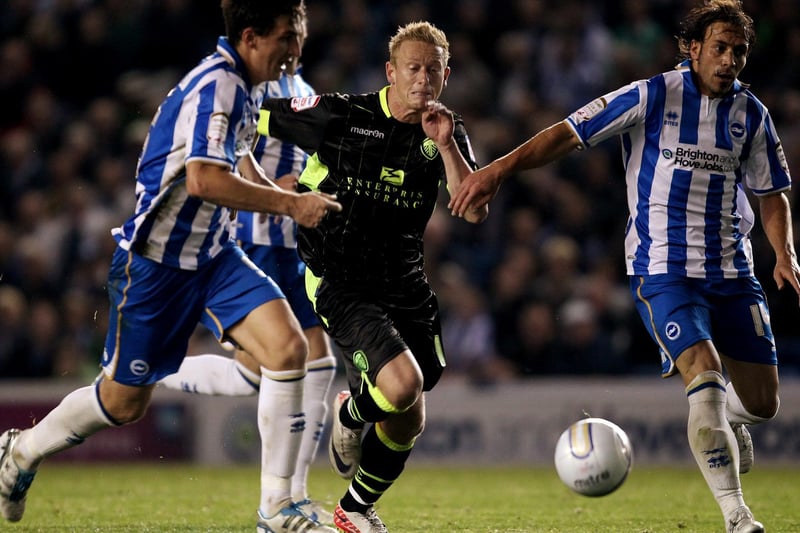 Mikael Forssell chases down Brighton's Lewis Dunk.