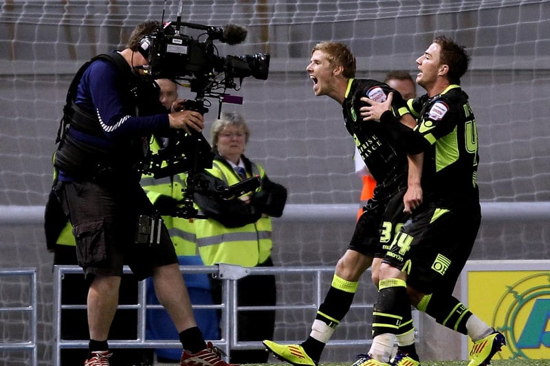 Andrew Keogh celebrates with the Sky TV cameraman after opening the scoring.