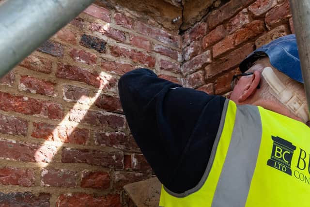 The original brickwork of Astley Hall is being revealed