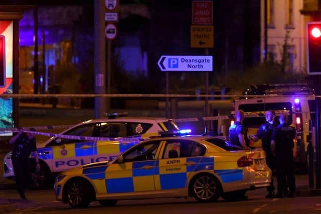 Police deploy at scene of explosion in Manchester, England, on May 23, 2017