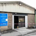 The fire broke out in the back of the shop, which remains cordoned off by fire crews this morning (April 28)