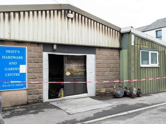 The fire broke out in the back of the shop, which remains cordoned off by fire crews this morning (April 28)