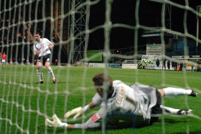 Brian O'Neil sees his penalty saved in the shoot-out against Barnsley