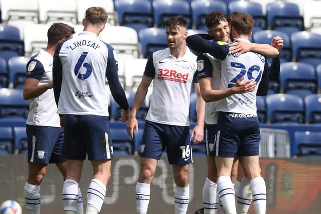 Jordan Storey is congratulated after opening the scoring against Barnsley