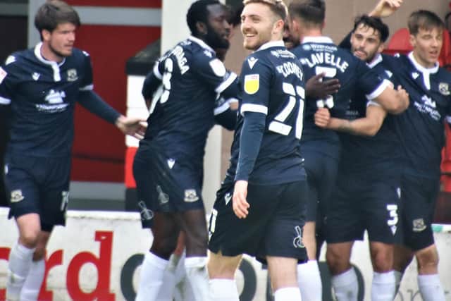 Morecambe maintained their automatic promotion hopes with victory at Walsall