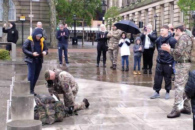 James kneeled at the memorial in the Flag Market on Sunday