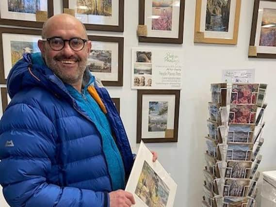 Bob Sutcliffe with some of his charity cards