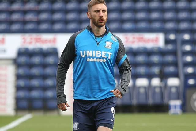 PNE striker Louis Moult in the pre-match warm-up ahead of the Brentford game