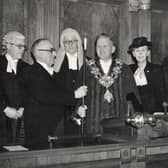 Outgoing Mayor Herbert Rhodes hands the staff of office to William Beckett in November, 1946. Also present are past mayor Alderman Margaret Pimblett and at far left, the Town Clerk, W Lockley
