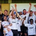 Matt Lawlor holds aloft the play-off final trophy after Brig won promotion from the NPL First Division North in 2018 (photo:Ruth Hornby)