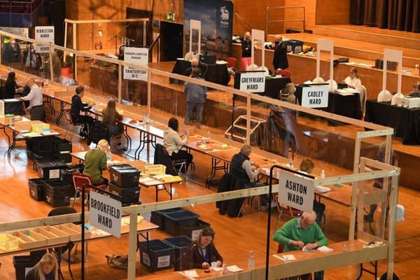 Socially-distanced vote-counters at work at the Guild Hall