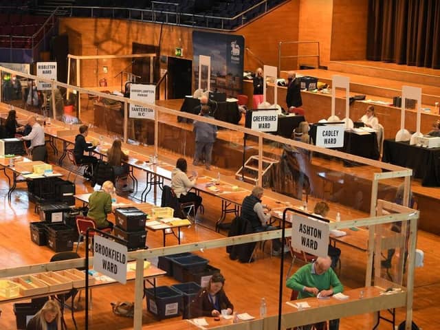 Socially-distanced vote-counters at work at the Guild Hall
