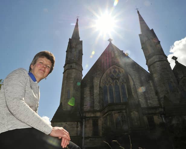 Revd Susan Seed pictured at Christ Church, Lancaster, showing the bell tower. Revd Susan is doing a zipwire challenge to raise church funds and funds for the Lancaster Friends of Chernobyl Children's (FOCC) group.