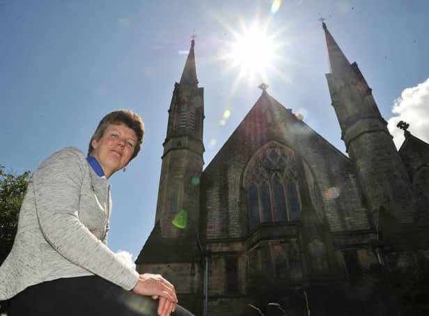 Revd Susan Seed pictured at Christ Church, Lancaster, showing the bell tower. Revd Susan is doing a zipwire challenge to raise church funds and funds for the Lancaster Friends of Chernobyl Children's (FOCC) group.