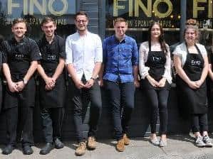 Mark O'Rourke (white shirt) and some of his team