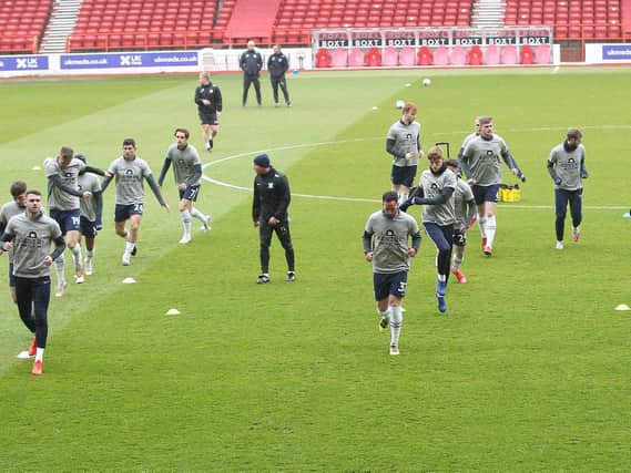 Preston North End warm up in Gentry Day t shirts ahead of their win over Nottingham Forest.