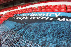 The Gentry flag was spread over seats in the empty away end at the City Ground