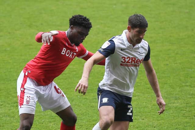 Preston North End’s Ched Evans with Nottingham Forest’s Loic Mbe Soh