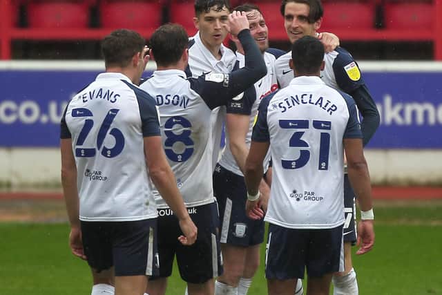 Tom Bayliss celebrates with his team-mates after equalising for Preston North End against Nottingham Forest