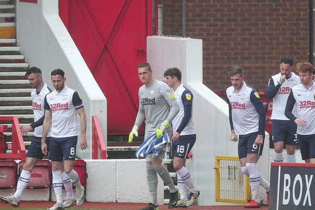 Daniel Iversen walks on to the pitch with his PNE team-mates at Nottingham Forest