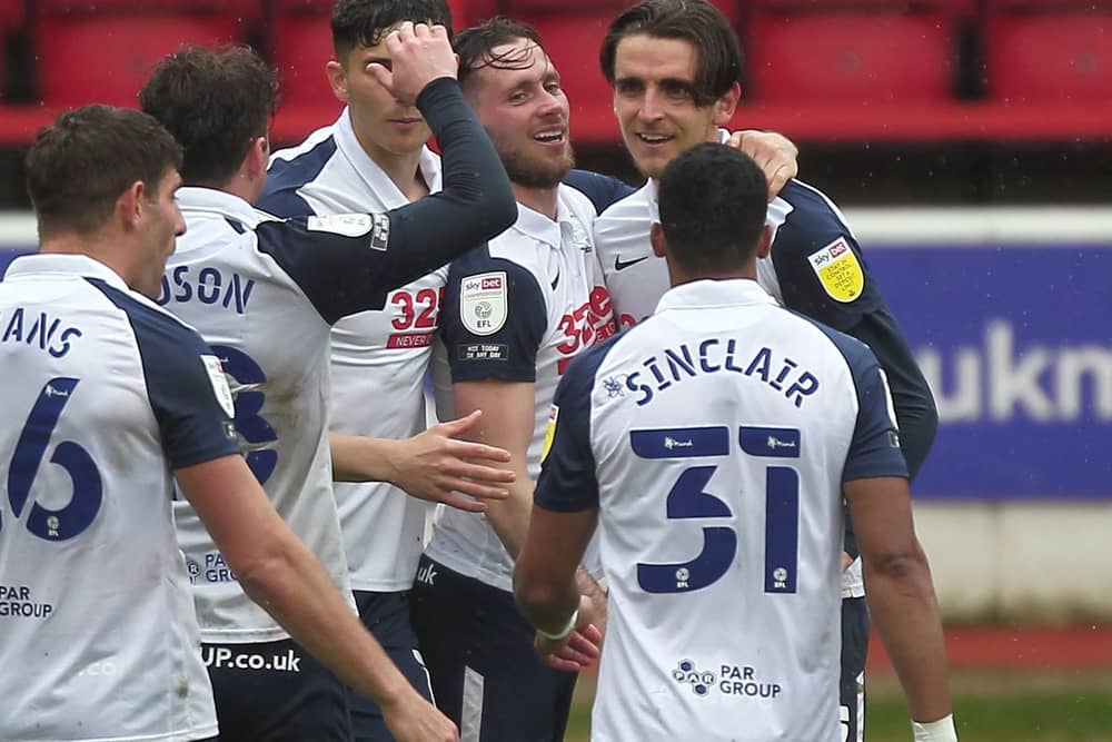Tom Bayliss is mobbed by his team-mates after scoring Preston North End's equaliser against Nottingham Forest