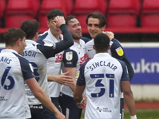Tom Bayliss is mobbed by his team-mates after scoring Preston North End's equaliser against Nottingham Forest