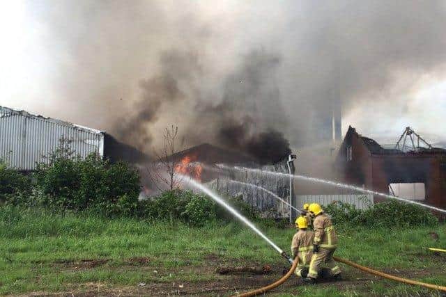 Firefighters battling the blaze at Whitfire Shaving and Sawdust Supplies in Farington Moss in June 2016