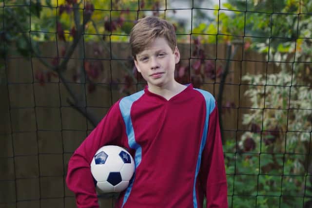 Foster child, Mark. Picture posed by a model.
