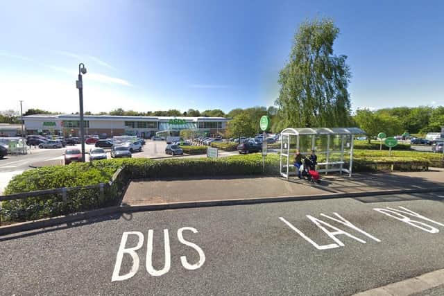 The brave shoppers intervened after they spotted a lone female officer who was trying to detain two 'aggressive' men at a bus stop outside the superstore in Clayton Green on Wednesday morning (May 12)