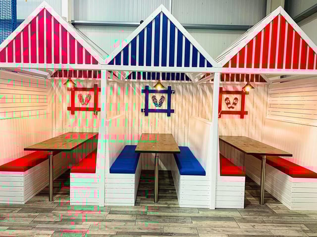 The new beach huts inside Jollies Barn