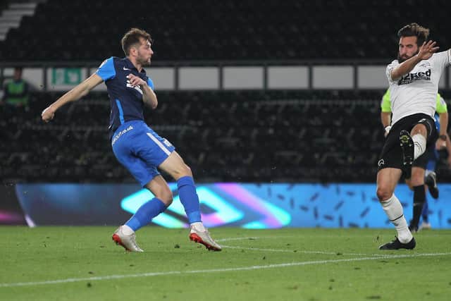 Tom Barkhuizen volleys home PNE's equaliser at Derby in the Carabao Cup