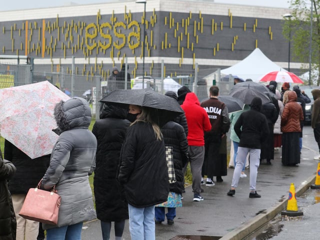 Queues outside the Essa Academy school in Bolton