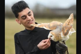 Animal lover with a huge heart - the late Bailey Lister pictured with one of the rescue owls. A GoFundMe for his funeral has nearly reached the total target