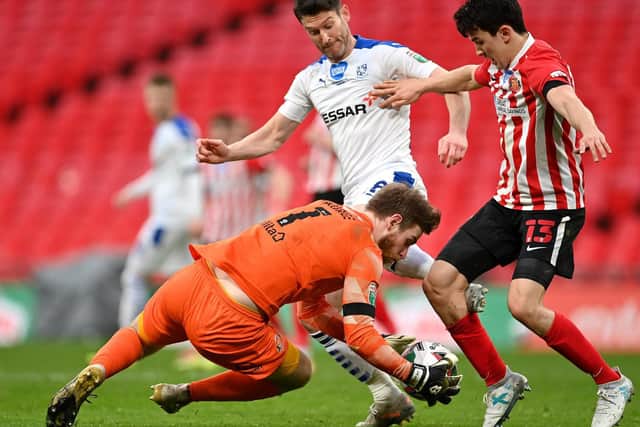David Nugent challenges for the ball playing for loan club Tranmere against Sunderland at Wembley in the Papa John's Trophy final