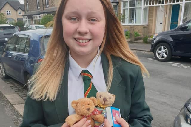 Over the moon to have her precious teddy back with a companion!