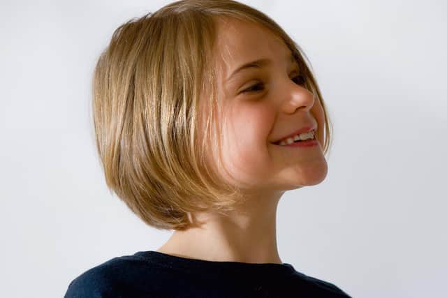 Eden enjoys her new haircut after raising hundreds for charity. Photos: Ian Heslop.