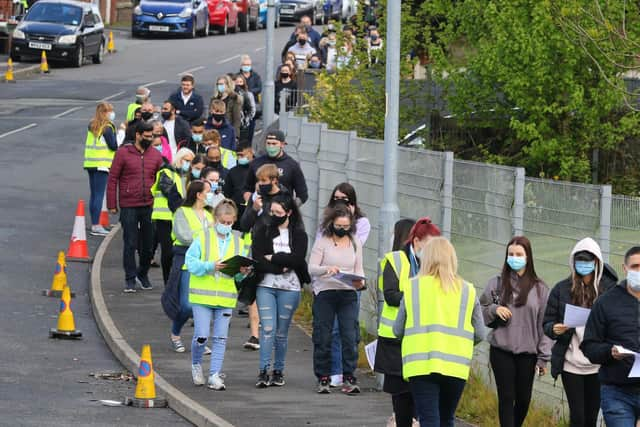 Residents in Bolton once again queuing in their thousands to get a Covid-19 vaccination on Sunday