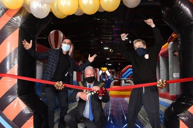 Coun David Borrow today opened the new Jump Maniax inflatable centre, along with director Samir Patel and manager Martin Bamber