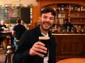 Radio One DJ and former I'm a Celebrity contestant Jordan North enjoys a pint at the Guild Ale House in Preston