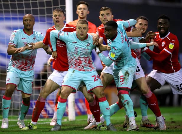 Action from Barnsley's play-off clash with Swansea at Oakwell on Monday night