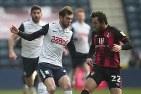 Bournemouth midfielder Ben Pearson (right) challenges his former Preston North End team-mate Tom Barkhuizen