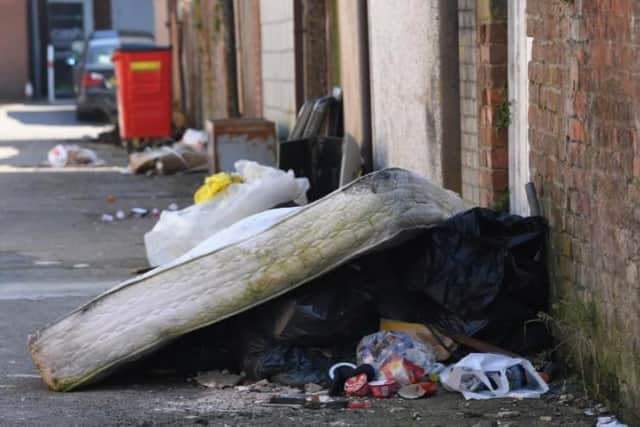 Fly-tipping in a back street off New Hall Lane, Preston.