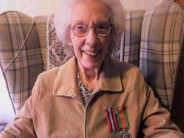 Mary wears her WW2 medals finally received in February 2018