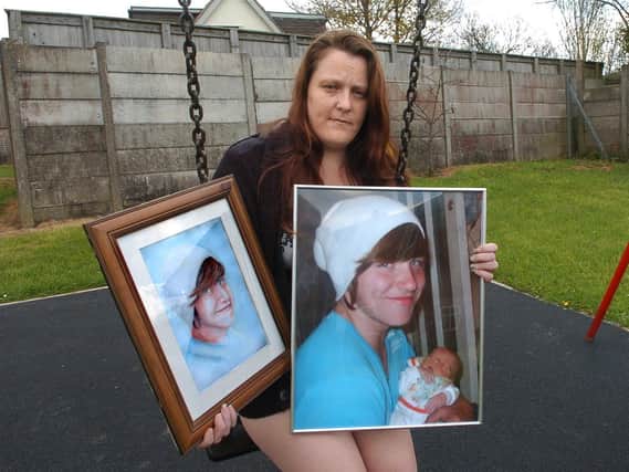 Beckie Ramsay with pictures of her son Dylan