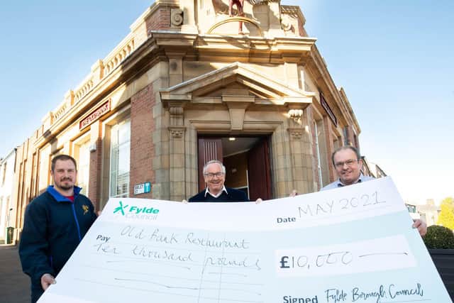 James and Andrew Booker of the Old Bank Restaurant in Kirkham receiving their grant cheque from Coun Richard Redcliffe