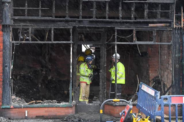 Eight fire engines and 40 firefighters battled the blaze which has completed gutted a vacant shop in Towngate, Leyland, and has damaged a number of flats above